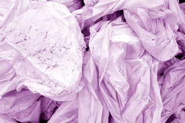 Dirty crumpled pvc in purple tone.