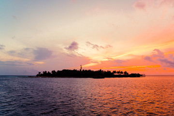 Fototapeta na wymiar sunset sky with Maldives Island