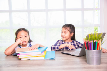 Little asian girl feel boring to learn computer