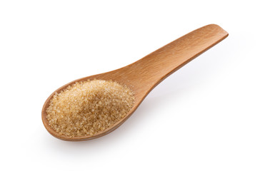 Brown sugar in wooden spoon on white background