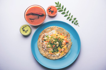 Egg Dosa is a popular south indian non-vegetarian breakfast or meal, served with sambar and chutney