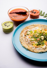Egg Dosa is a popular south indian non-vegetarian breakfast or meal, served with sambar and chutney