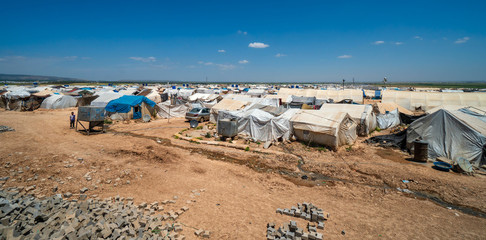 AZEZ, SYRIA – MAY 19: Refugee camp for syrian people in Burseya hill on May 19, 2019 in Azez, Syria. In the civil war that began in Syria in 2011, 12 million people were displaced.