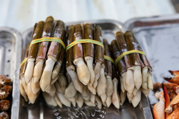 Snails taken out of the shell, Street Food stall Ho Chi Minh City, Vietnam