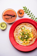Egg Dosa is a popular south indian non-vegetarian breakfast or meal, served with sambar and chutney
