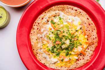 Egg Dosa is a popular south indian non-vegetarian breakfast or meal, served with sambar and chutney