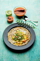 Egg Dosa is a popular south indian non-vegetarian breakfast or meal, served with sambar and chutney