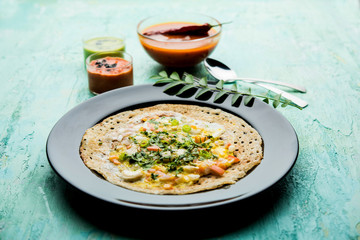 Egg Dosa is a popular south indian non-vegetarian breakfast or meal, served with sambar and chutney