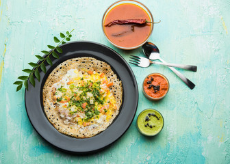 Egg Dosa is a popular south indian non-vegetarian breakfast or meal, served with sambar and chutney