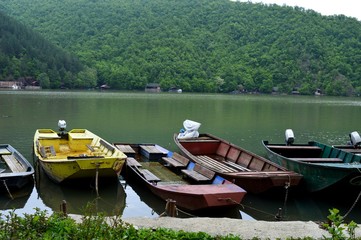 Naklejka na ściany i meble colorful boats on the river