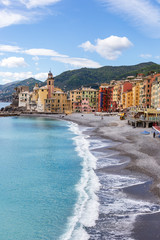 Camogli, Italy. 04-29-2019. Beach and colored houses at Camogli. Liguria. Italy.