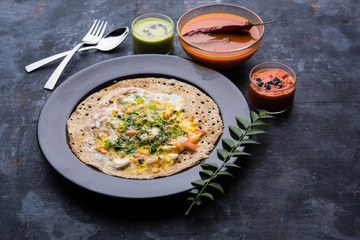 Egg Dosa is a popular south indian non-vegetarian breakfast or meal, served with sambar and chutney