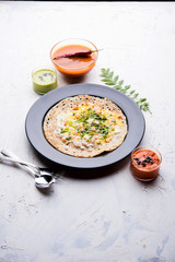 Egg Dosa is a popular south indian non-vegetarian breakfast or meal, served with sambar and chutney