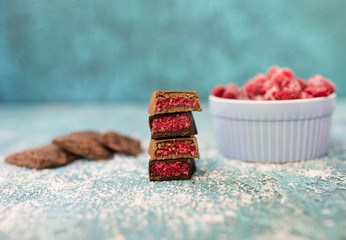 sweets with raspberries on the background