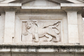 Bergamo, Italy. The Lion of Saint Mark in Porta San Giacomo, a winged lion holding a Bible symbol of the city of Venice and Venetian Republic