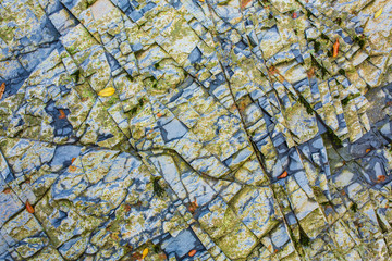 Closeup - beautiful structure of an ancient rock texture formation. Concept of natural background...