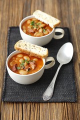 Sausage and white bean stew with tomatoes