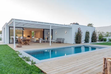 Foto op Canvas Modern villa with pool and garden © Luis Viegas