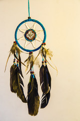 dream catcher hanging display on white background