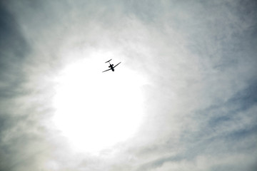 The airplane flies in the clouds.The plane flies in the clouds. bird`s eye view
