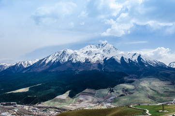 snow mountain and small village landscape view