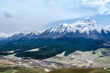 snow mountain and small village landscape view