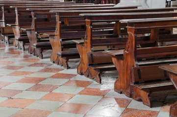 empty wooden pew in the church