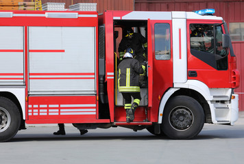 Fire engine and firefighters