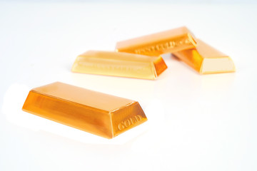 Heap of gold bars isolated on a white background Banking concept.