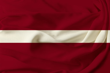 beautiful colored flag of Latvia on pleated silk fabric