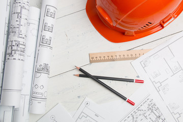 Paper architectural drawings and blueprints