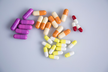 Pigment, tablet or pill. A collection of medicines and vitamins. Dietary supplementation