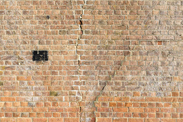Subsidence cracks brick wall