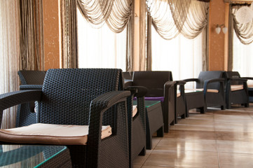 interior in the room. Many large chairs and tables. In the room for breath.