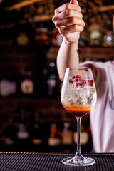 Fresh summer lemonade with berries on the bar table