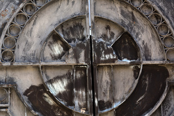 Iron gate with a pattern of rust. Concept - closed entrance