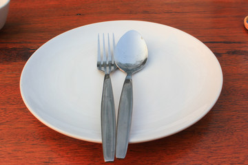 White dish on the wood table