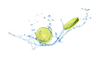 Slices of juicy lime and splashing cold water on white background