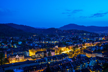 Germany, Houses of city freiburg im breisgau in black forest nature landscape in magic atmosphere