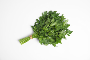 Bunch of fresh green parsley on white background, top view
