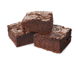 Pieces of fresh brownie on white background. Delicious chocolate pie