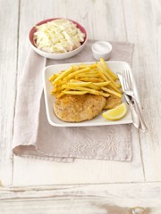 Turkey chops with fries and cabbage salad