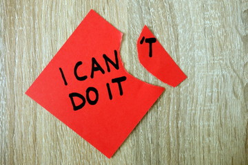 Motivational text I can do it written on red sticker