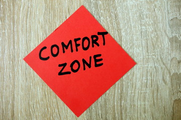 Fototapeta na wymiar Comfort zone text written on red sticker