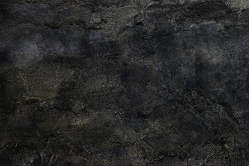 Black Textured Cement Plaster Wall as Background