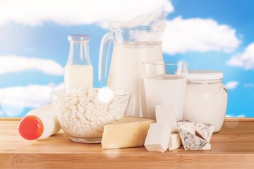 Glass of milk  and Dairy products on  background