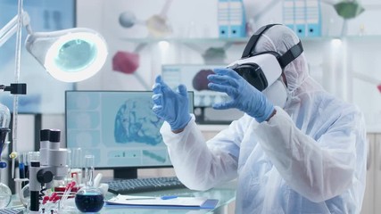 Scientist using VR headset and virtual reality to learn and discover new things about human brain and anatomy - Powered by Adobe