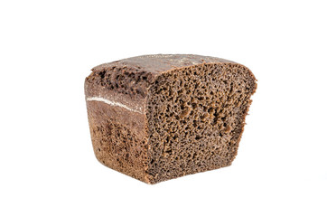 half a loaf of black bread, isolated on white. Close-up.