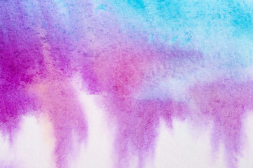 watercolor background filled blue wet paint drawing technique, purple with stains of paint spread over the paper. on textured watercolor paper paint