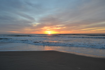 Fototapeta na wymiar amanecer playa punta del este